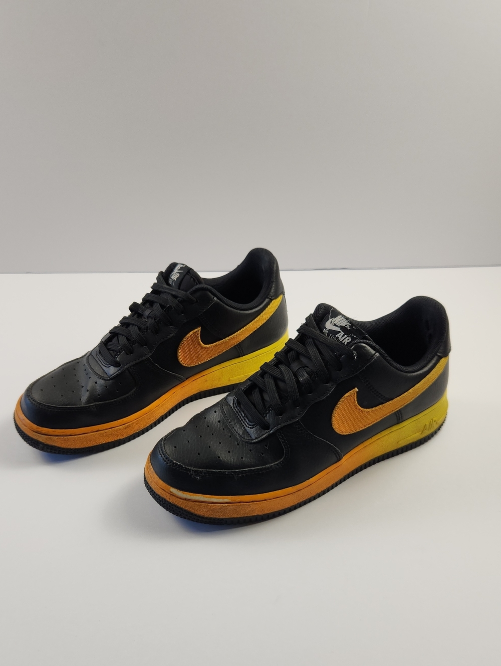 Nike Men’s Low-Top Sneakers — Black with Orange and Yellow Accents